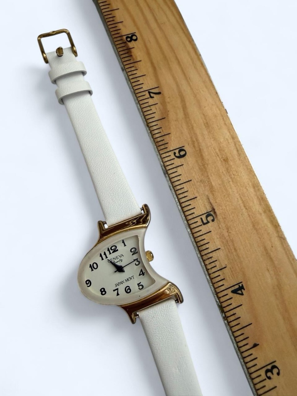 Geneva White Strap Asymmetrical Gold-Tone Accent Watch